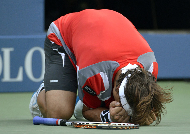 David Ferrer örül a Janko Tipszarevics elleni győzelmének a US Open negyeddöntőjében 2012-ben.