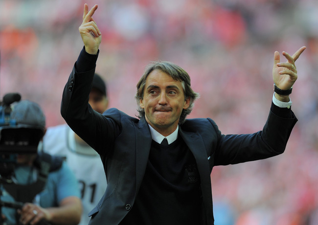 Roberto Mancini egyre feljebb szeretne jutni a City-vel - fotó: AFP