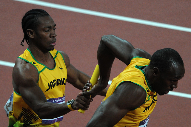 Yohan Blake és Usain Bolt a londoni olimpia 4x100 méteres síkfutó váltójának döntőjében Jamaica színeiben 2012-ben.