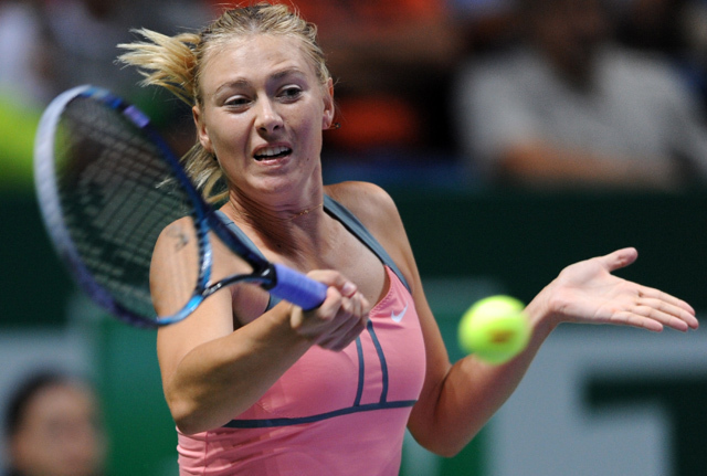 2013-ban Wimbledonban is nyerő ütésekre készül Sarapova - Fotó: AFP
